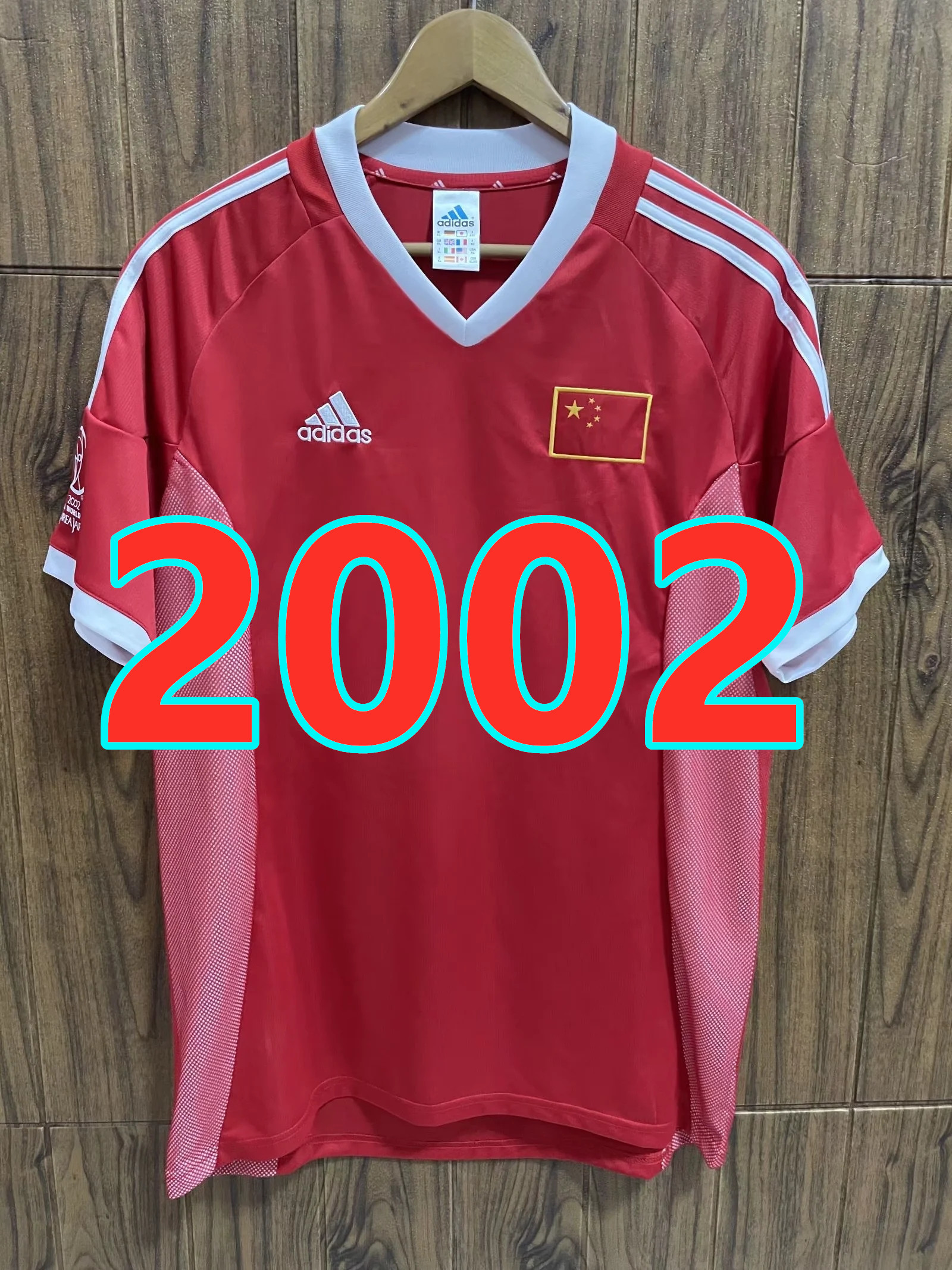 Maillot extérieur Chine 2002 rétro qualité TopThai